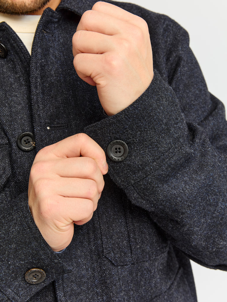 Close up of cuff details on FRAHM Merino Woodland Workers Jacket 2026 Dark Navy Herringbone