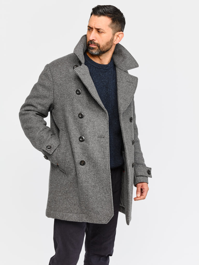 Model wearing FRAHM Pure Wool Peacoat 2026 Salt and Pepper Grey in studio