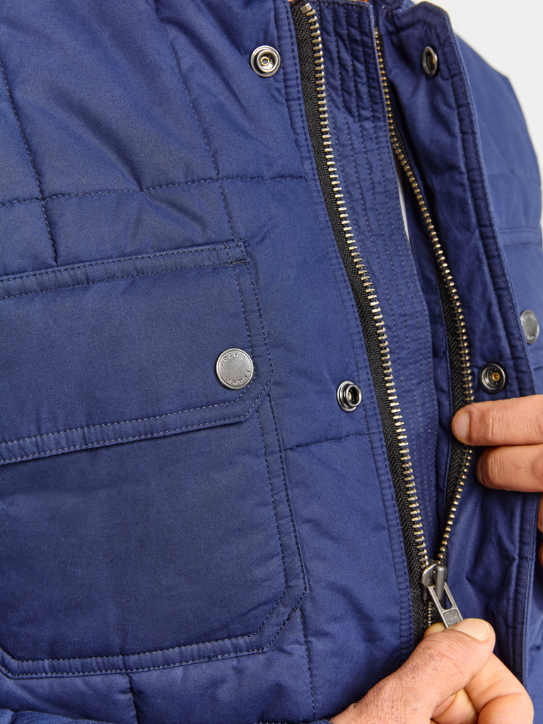 Close up of fabric and zipper on FRAHM Quilted Winter Workers Jacket 2026 Dark Navy