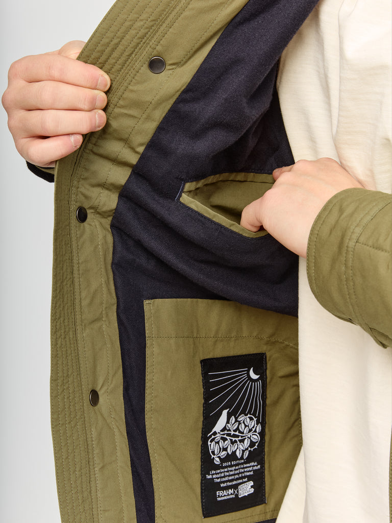Close up of inner fabric and pocket of FRAHM Quilted Winter Workers Jacket 2026 Olive Green