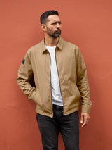 Model wearing FRAHM Lightweight Blouson Jacket 2027 Light Tan front view