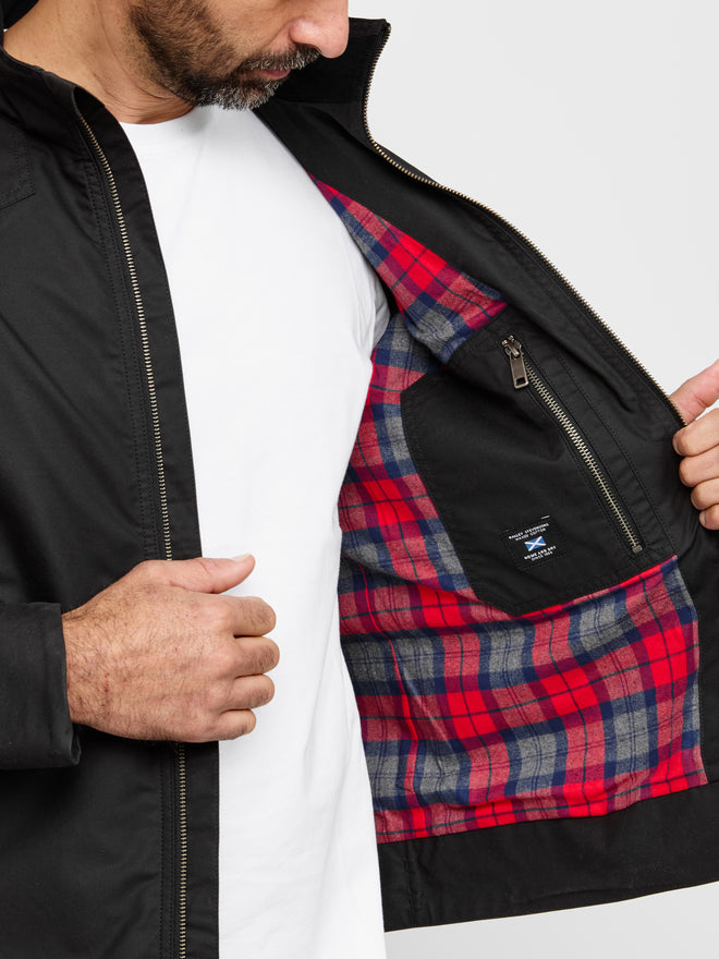 Model wearing FRAHM Harrington Racer Jacket 2027 Black showing lining, inner pocket and zipper details
