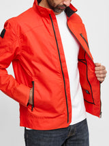 Model wearing FRAHM Harrington Racer Jacket in Motorsport Orange front view details