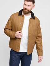 Model wearing Heavy Twill Deck Jacket in American Tan indoor front view