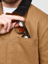 FRAHM Heavy Twill Deck Jacket in American Tan front pocket detail with sunglasses