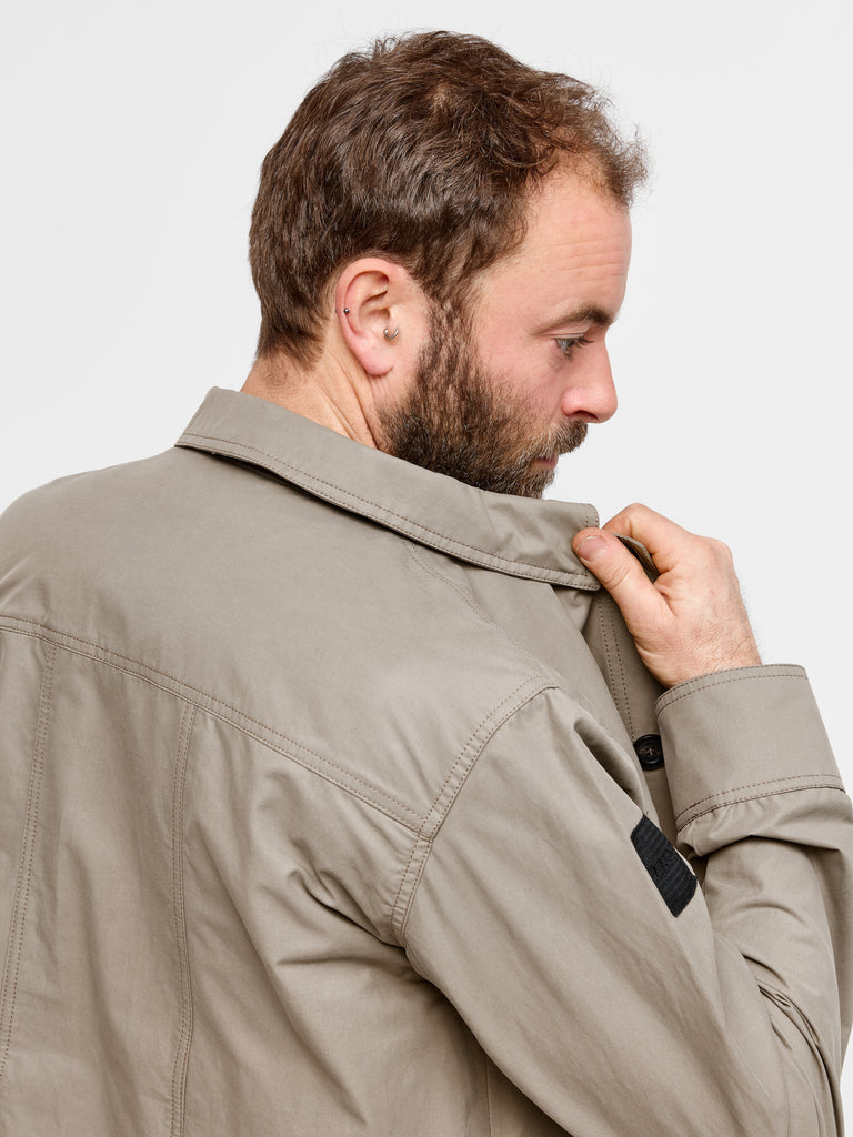 Close up of model wearing FRAHM Original Lightweight Workers Jacket 2027 Italian Beige