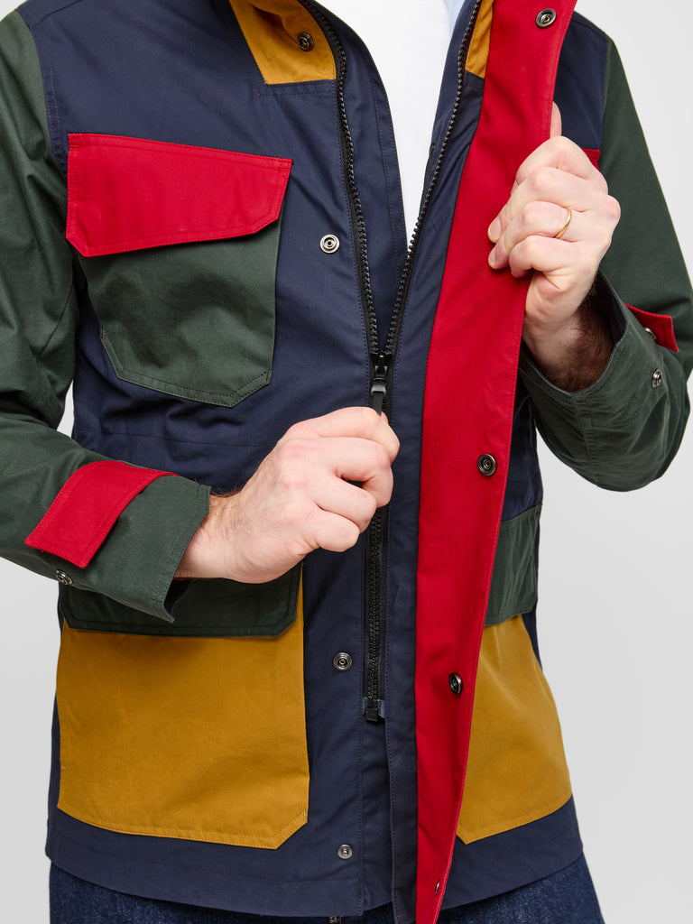 Detail of stitching and zipper on FRAHM Waxed Hooded Field Coat in Technicolour