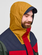 Model wearing Waxed Hooded Field Coat in Technicolour showing hood detail