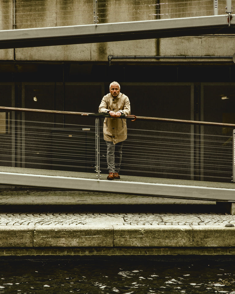 Model wearing FRAHM Classic Trench Coat 2027 in Beige in London
