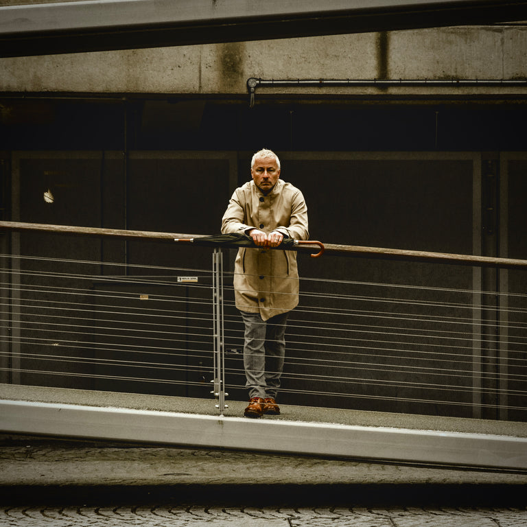 Nick on bridge in London wearing FRAHM Trench coat