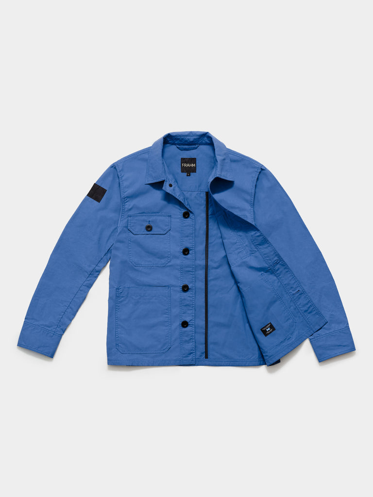 Flat lay of FRAHM Waxed Lightweight Workers Jacket 2026 Cornflower Blue showing inner fabric detail